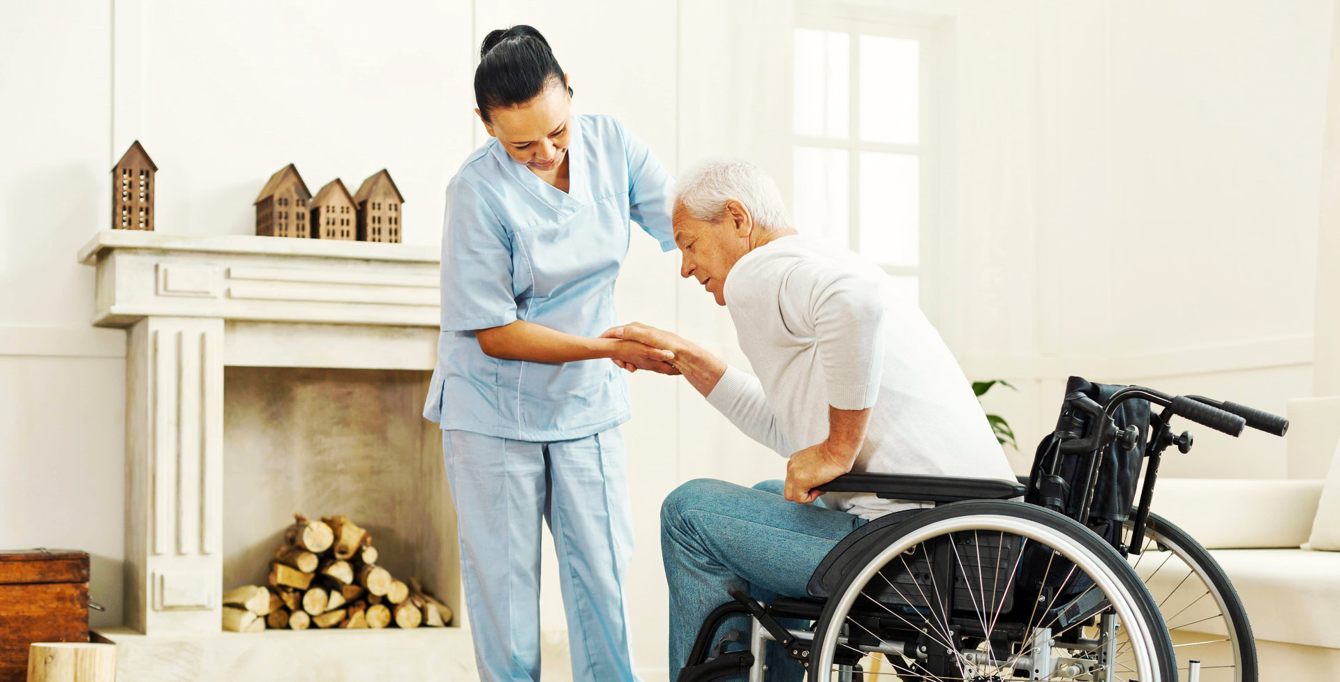 a caregiver helping an elderly man