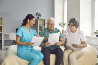 caregiver and her old couple patients